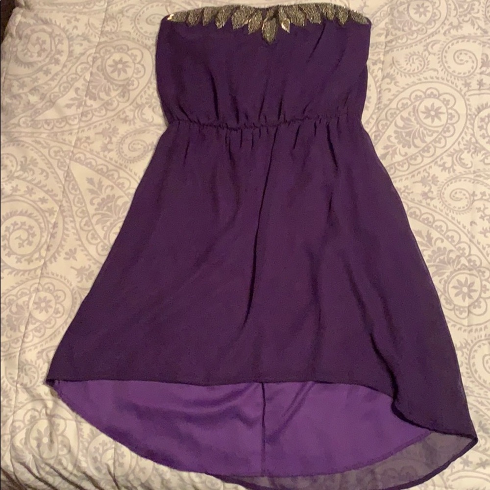 Strapless purple dress with beading detail